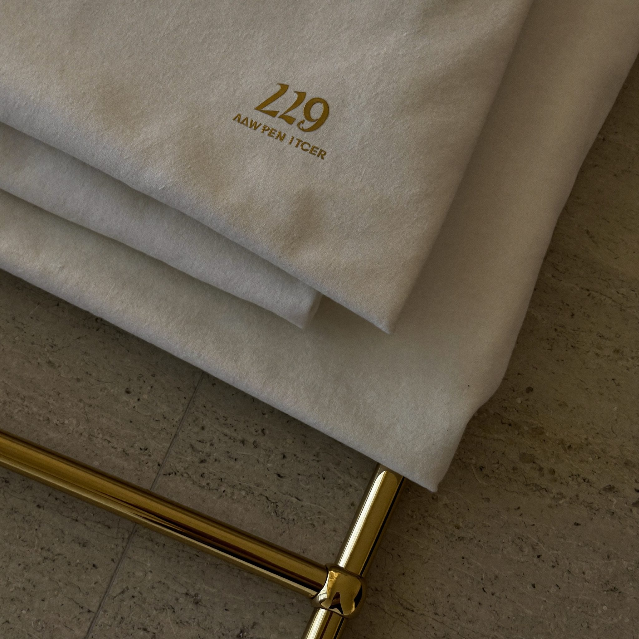 Detail of linen, brass and stone textures at Vernora
